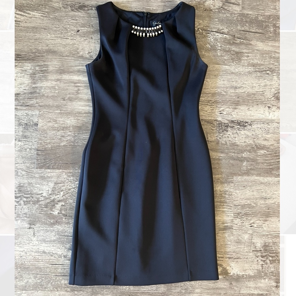 Navy Blue size 4 above the knee dress with crystal detail